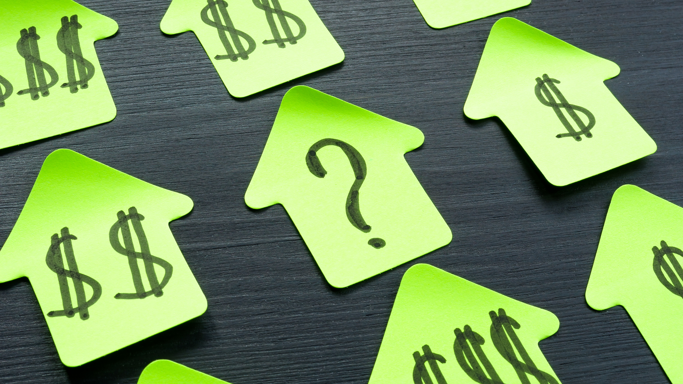 Business evaluating the costs of implementing artificial intelligence.